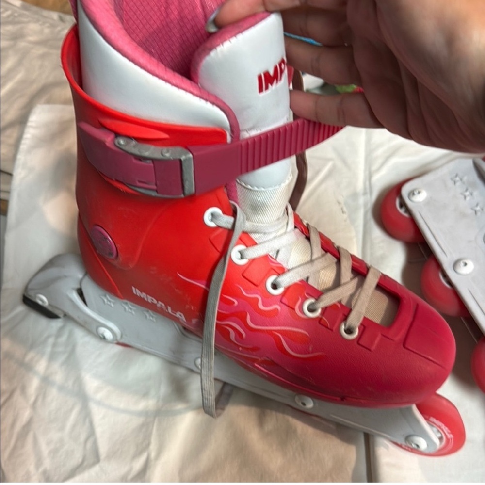 Red and Pink Women's Roller Skates